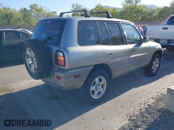 1999 Toyota RAV4 with VIN JT3HP10V5X7139594, listed as a IAAI auction lot 42029970 with 199,204 mi miles and . Bid and sale history available at DreamBid. Image 4.