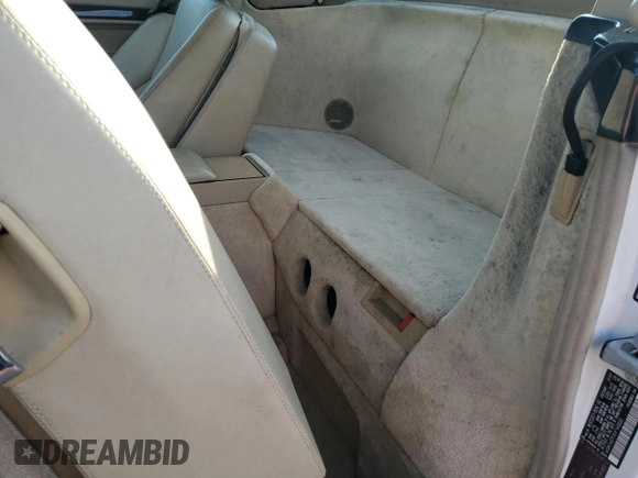 1997 Mercedes-Benz SL 500 with VIN WDBFA67FXVF149930, listed as a Copart auction lot 64749525 with 88,523 mi miles and Salvage title. Bid and sale history available at DreamBid. Image 10.