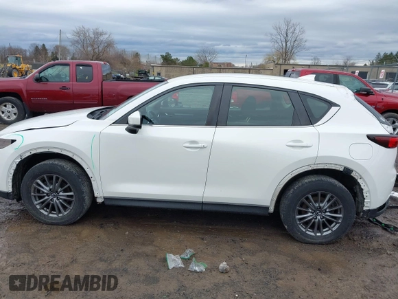2019 Mazda CX-5 Sport with VIN JM3KFBBM2K0629966, listed as a IAAI auction lot 41953702 with 48,496 mi miles and . Bid and sale history available at DreamBid. Image 15.