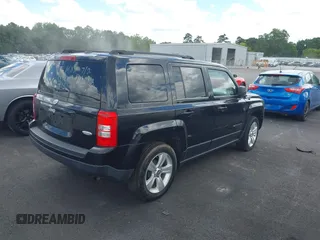 2014 Jeep Patriot Latitude z VIN 1C4NJPFB9ED549989, wystawiony jako IAAI lot #42656294 z przebiegiem 89 945 mil mil oraz . Historia ofert i sprzedaży dostępna na DreamBid. Obrazek 4.