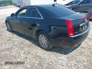 2013 Cadillac CTS Luxury with VIN 1G6DE5E55D0118722, listed as a IAAI auction lot 42448616 with 131,906 mi miles and . Bid and sale history available at DreamBid. Image 3.