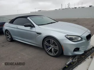 2014 BMW M6 z VIN WBSLZ9C56EDZ78719, wystawiony jako Copart lot #42445545 z przebiegiem 63 691 mil mil oraz Szkoda całkowita • Salvage title. Historia ofert i sprzedaży dostępna na DreamBid. Obrazek 4.