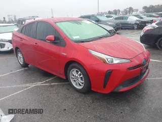 2021 Toyota Prius L Eco z VIN JTDKAMFU8M3134640, wystawiony jako IAAI lot #41512395 z przebiegiem 30 509 mil mil oraz . Historia ofert i sprzedaży dostępna na DreamBid. Obrazek 1.