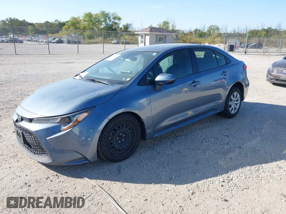 2022 Toyota Corolla LE with VIN JTDEPMAE1NJ200552, listed as a IAAI auction lot 40465421 with 62,929 mi miles. Bid and sale history available at carsss.com. Image 2.