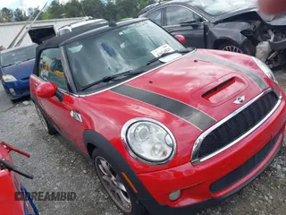 2010 MINI Convertible S with VIN WMWMS3C53AT012001, listed as a IAAI auction lot 42024826 with 110,471 mi miles and . Bid and sale history available at DreamBid. Image 1.