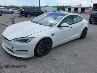 2022 Tesla Model S Plaid with VIN 5YJSA1E61NF460155, listed as a IAAI auction lot 42545167 with 51,711 mi miles and . Bid and sale history available at DreamBid. Image 18.