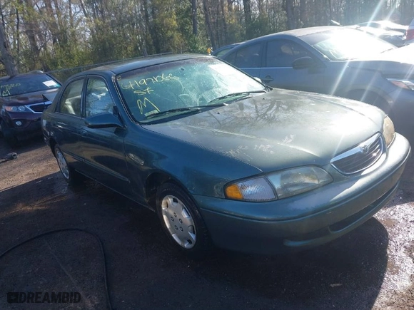 1998 Mazda 626 DX with VIN 1YVGF22C4W5768778, listed as a IAAI auction lot 41971066 with 119,168 mi miles. Bid and sale history available at carsss.com. Image 1.