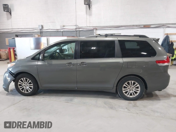 2011 Toyota Sienna XLE AAS with VIN 5TDYK3DC8BS111639, listed as a IAAI auction lot 42108488 with 300,872 mi miles and . Bid and sale history available at DreamBid. Image 14.