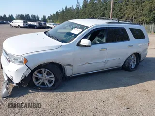 2013 Dodge Durango Crew with VIN 1C4RDJDG3DC664855, listed as a IAAI auction lot 42109159 with 148,440 mi miles and . Bid and sale history available at DreamBid. Image 6.