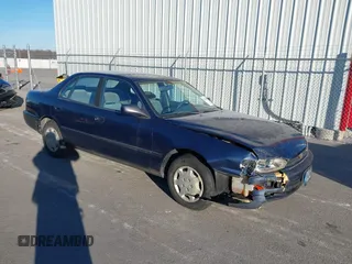 1994 Toyota Camry LE with VIN 4T1SK12EXRU374215, listed as a IAAI auction lot 41581093 with 80,397 mi miles. Bid and sale history available at carsss.com. Image 1.