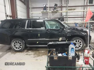 2015 GMC Yukon XL SLT with VIN 1GKS2HKC9FR175011, listed as a IAAI auction lot 41510519 with 194,136 mi miles. Bid and sale history available at carsss.com. Image 13.