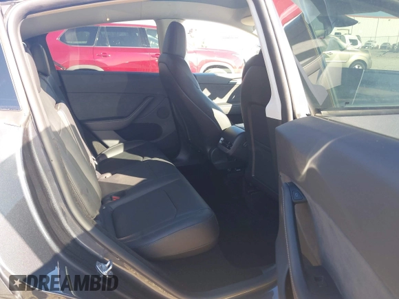 2024 Tesla Model Y Long Range with VIN 7SAYGDEE8RA293641, listed as a IAAI auction lot 41891018 with 7,341 mi miles and . Bid and sale history available at DreamBid. Image 8.