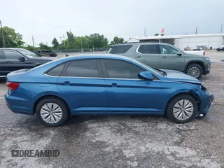 2019 Volkswagen Jetta S z VIN 3VWC57BU4KM005853, wystawiony jako IAAI lot #42183004 z przebiegiem 104 691 mil mil oraz . Historia ofert i sprzedaży dostępna na DreamBid. Obrazek 13.