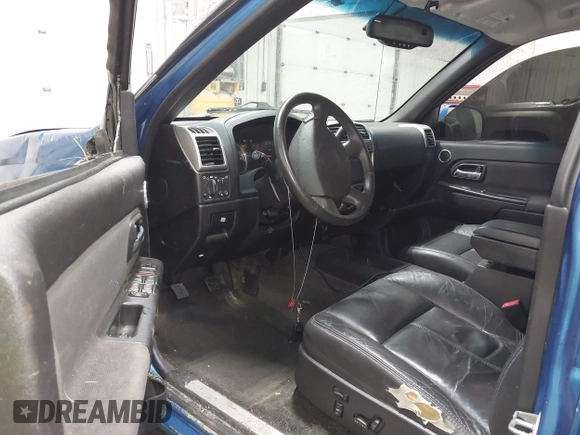 2011 GMC Canyon SLT with VIN 1GTH6NFP8B8115436, listed as a IAAI auction lot 41676023 with 148,478 mi miles. Bid and sale history available at carsss.com. Image 5.