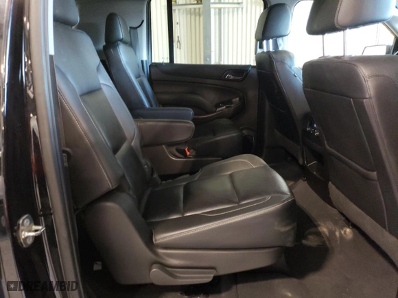 2019 Chevrolet Suburban LT with VIN 1GNSKHKC2KR299019, listed as a Copart auction lot 42623215 with 84,747 mi miles and Salvage Title. Bid and sale history available at carsss.com. Image 11.