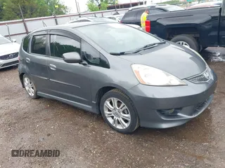 2011 Honda Fit Sport z VIN JHMGE8H51BC003715, wystawiony jako IAAI lot #42108476 z przebiegiem 174 228 mil mil oraz . Historia ofert i sprzedaży dostępna na DreamBid. Obrazek 1.