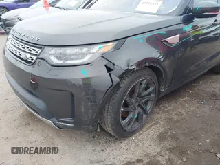 2018 Land Rover Discovery HSE with VIN SALRR2RV9JA064064, listed as a IAAI auction lot 41292355 with 94,430 mi miles and . Bid and sale history available at DreamBid. Image 6.
