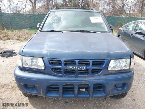 2002 Isuzu Rodeo S with VIN 4S2CK58W124320988, listed as a IAAI auction lot 41921874 with 227,320 mi miles. Bid and sale history available at carsss.com. Image 6.