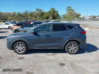 2021 Hyundai Tucson Value with VIN KM8J33A4XMU362300, listed as a IAAI auction lot 41743089 with 62,693 mi miles. Bid and sale history available at carsss.com. Image 14.