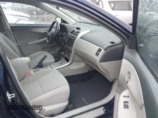 2012 Toyota Corolla L with VIN 2T1BU4EE5CC875318, listed as a IAAI auction lot 41962101 with 125,078 mi miles. Bid and sale history available at carsss.com. Image 5.