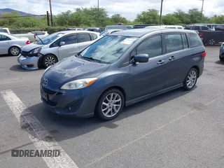 2012 Mazda 5 Grand Touring with VIN JM1CW2DL0C0139982, listed as a IAAI auction lot 42703430 with 129,763 mi miles and . Bid and sale history available at DreamBid. Image 2.