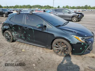 2021 Toyota Corolla Hatchback SE with VIN JTND4MBE7M3135630, listed as a Copart auction lot 64594624 with 63,106 mi miles and Salvage Title. Bid and sale history available at carsss.com. Image 4.
