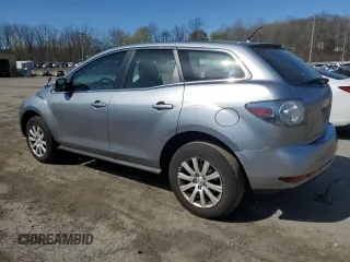2012 Mazda CX-7 i SV z VIN JM3ER2AM2C0412683, wystawiony jako Copart lot #53774075 z przebiegiem 196 344 mil mil oraz Czysty tytuł • Clean title. Historia ofert i sprzedaży dostępna na DreamBid. Obrazek 2.
