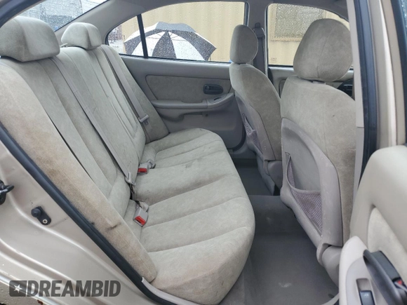 2003 Hyundai Elantra GLS z VIN KMHDN45D43U663926, wystawiony jako Copart lot #50036625 z przebiegiem 152 174 mil mil oraz Szkoda całkowita • Salvage title. Historia ofert i sprzedaży dostępna na DreamBid. Obrazek 10.