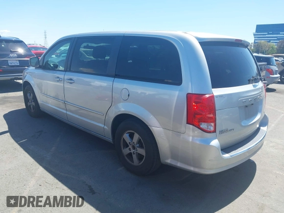2012 Dodge Grand Caravan SXT with VIN 2C4RDGCG7CR204835, listed as a IAAI auction lot 41948688 with 125,466 mi miles and . Bid and sale history available at DreamBid. Image 3.