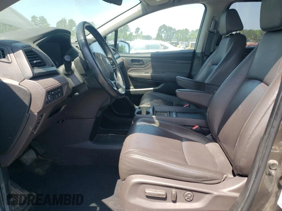 2019 Honda Odyssey Touring z VIN 5FNRL6H87KB098010, wystawiony jako Copart lot #54791505 z przebiegiem 94 477 mil mil oraz Szkoda całkowita • Salvage title. Historia ofert i sprzedaży dostępna na DreamBid. Obrazek 7.