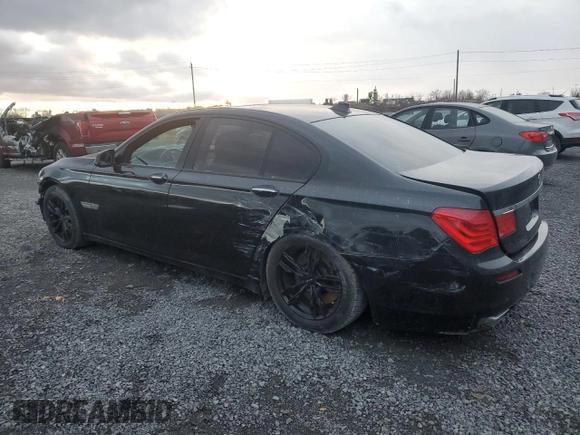 2011 BMW 7 Series 750i xDrive with VIN WBAKC6C54BC395163, listed as a Copart auction lot 82184484 with 74,331 mi miles and Clean title. Bid and sale history available at DreamBid. Image 2.