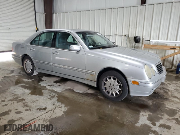 2001 Mercedes-Benz E-Class with VIN WDBJF65J61B198210, listed as a Copart auction lot 72616744 with 305,814 mi miles and Salvage Title. Bid and sale history available at carsss.com. Image 4.