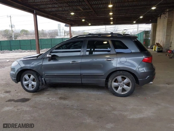 2009 Acura RDX Tech Pkg with VIN 5J8TB18569A000820, listed as a IAAI auction lot 41612663 with 150,886 mi miles. Bid and sale history available at carsss.com. Image 14.