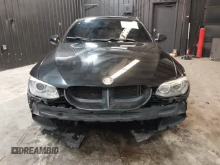 2011 BMW 3 Series 335is with VIN WBAKG1C51BE618450, listed as a IAAI auction lot 41555179 with 100,942 mi miles and . Bid and sale history available at carsss.com. Image 6.
