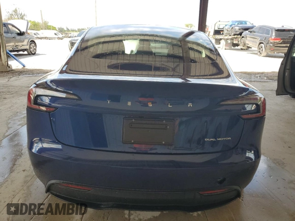 2025 Tesla Model 3 Long Range with VIN 5YJ3E1EBXSF941345, listed as a Copart auction lot 60229865 with 1,711 mi miles and Salvage title. Bid and sale history available at DreamBid. Image 6.