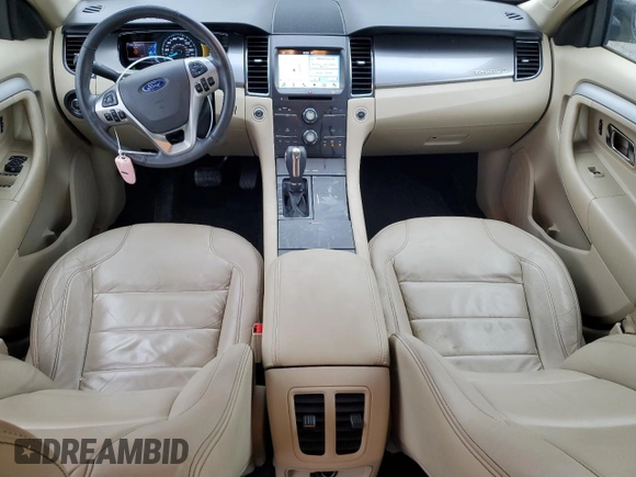 2016 Ford Taurus SEL with VIN 1FAHP2E88GG137607, listed as a Copart auction lot 61356505 with 33,768 mi miles and Salvage title. Bid and sale history available at DreamBid. Image 8.