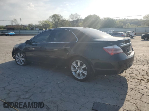 2009 Acura RL Tech Pkg with VIN JH4KB266X9C001760, listed as a Copart auction lot 52303615 with 232,253 mi miles and Salvage Title. Bid and sale history available at carsss.com. Image 2.