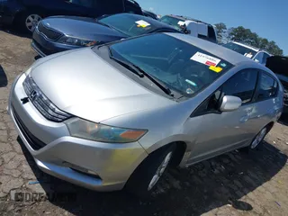 2010 Honda Insight EX with VIN JHMZE2H75AS013109, listed as a IAAI auction lot 41976886 with 226,434 mi miles and . Bid and sale history available at DreamBid. Image 17.