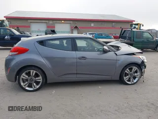 2014 Hyundai Veloster with VIN KMHTC6AD5EU183478, listed as a IAAI auction lot 42107170 with 64,905 mi miles. Bid and sale history available at carsss.com. Image 14.
