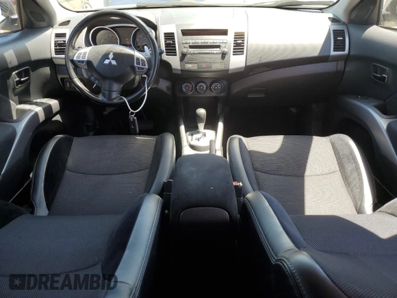 2012 Mitsubishi Outlander SE z VIN JA4AS3AW9CU031502, wystawiony jako Copart lot #57975515 z przebiegiem 115 602 mil mil oraz Tytuł czysty. Historia ofert i sprzedaży dostępna na DreamBid. Obrazek 8.
