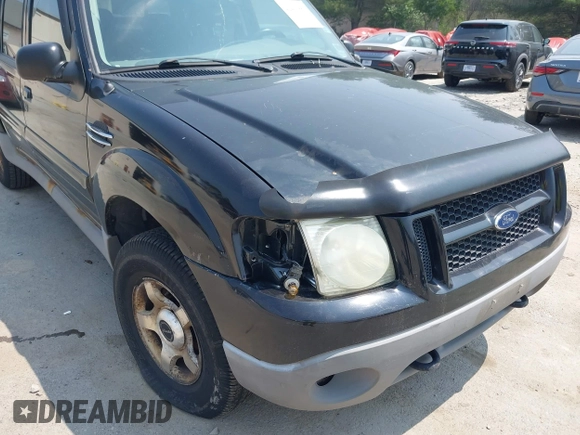 2003 Ford Explorer Sport Trac XLS z VIN 1FMZU77EX3UA50273, wystawiony jako IAAI lot #42406881 z przebiegiem 217 961 mil mil oraz . Historia ofert i sprzedaży dostępna na DreamBid. Obrazek 6.