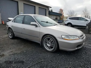 1998 Honda Accord LX with VIN 1HGCG5540WA180862, listed as a Copart auction lot 87071084 with 394,803 mi miles and Salvage title. Bid and sale history available at DreamBid. Image 4.