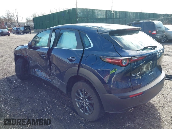 2023 Mazda CX-30 S with VIN 3MVDMBAM1PM583896, listed as a IAAI auction lot 41732091 with 26,298 mi miles and . Bid and sale history available at carsss.com. Image 3.