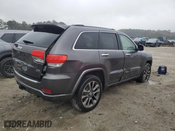 2018 Jeep Grand Cherokee High Altitude with VIN 1C4RJECG9JC221896, listed as a Copart auction lot 43239165 with 101,603 mi miles and Clean title. Bid and sale history available at DreamBid. Image 3.