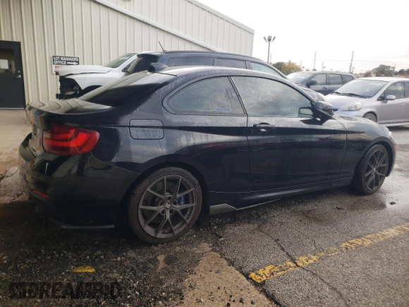 2015 BMW 2 Series M235i xDrive with VIN WBA1J9C53FV371160, listed as a Copart auction lot 77395844 with 148,064 mi miles and Clean Title. Bid and sale history available at carsss.com. Image 3.