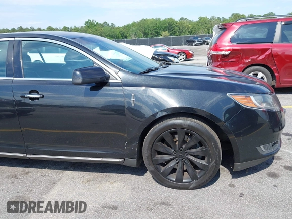 2015 Lincoln MKS с VIN 1LNHL9DK2FG600346, выставлен на аукционе IAAI как лот 42282772 с пробегом 347 761 миль миль и . История ставок и продаж доступна на DreamBid. Изображение 17.