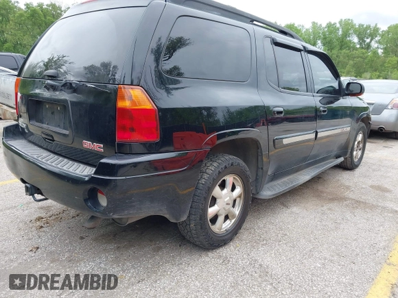 2005 GMC Envoy XL SLE with VIN 1GKET16S156114805, listed as a IAAI auction lot 42163519 with 168,584 mi miles. Bid and sale history available at carsss.com. Image 4.