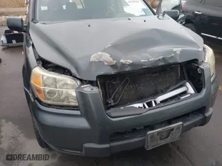2006 Honda Pilot EX-L with VIN 2HKYF18526H563831, listed as a IAAI auction lot 41255427 with 237,074 mi miles. Bid and sale history available at carsss.com. Image 6.