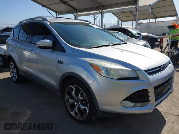 2015 Ford Escape Titanium with VIN 1FMCU0J90FUA43720, listed as a IAAI auction lot 42541048 with 98,948 mi miles and . Bid and sale history available at DreamBid. Image 1.