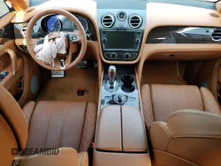 2019 Bentley Bentayga V8 z VIN SJAAM2ZV4KC026896, wystawiony jako Copart lot #57332313 z przebiegiem Nie podano mil oraz . Historia ofert i sprzedaży dostępna na DreamBid. Obrazek 8.